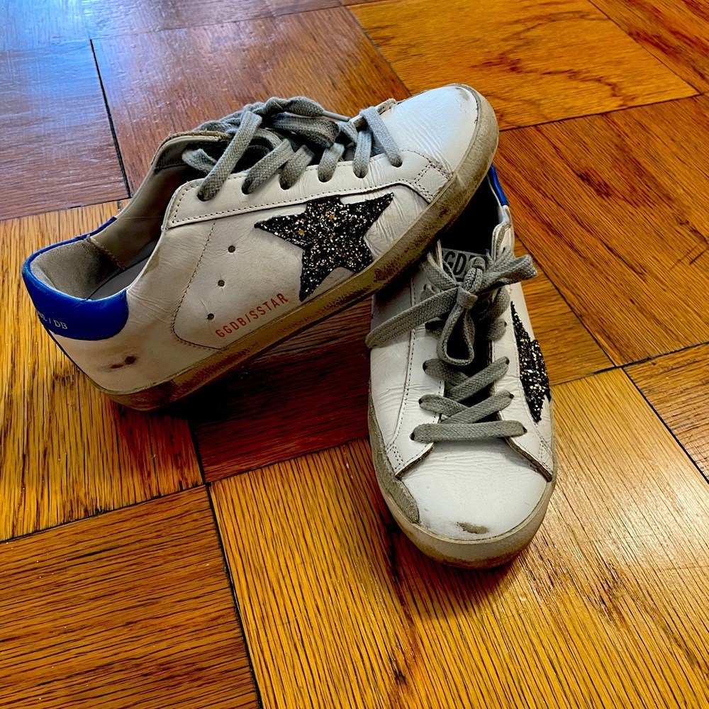 Golden Goose Superstar sneaker size 34. Barely worn Black star w/ blue accent